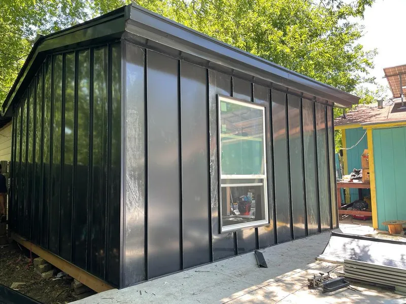 Black standing seam metal wall panels for Roof Inspection in Anniston